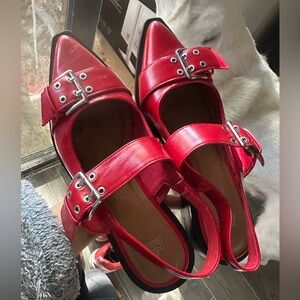 Red pointed flats with buckles